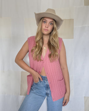 Vintage button-up pink sweater vest. Women's size medium to large.